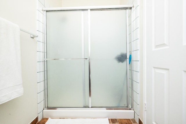 5263 W Griffith Way, Fresno, CA 93722 - bathroom featuring a stall shower