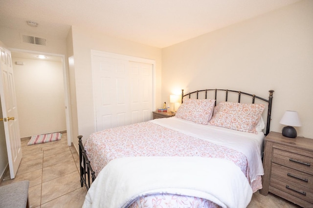 5263 W Griffith Way, Fresno, CA 93722 - bedroom featuring a closet and light tile patterned floors