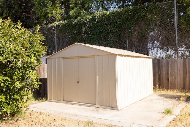5263 W Griffith Way, Fresno, CA 93722 - view of shed featuring a fenced backyard