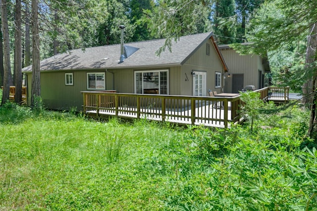 42055 Saddleback Rd, Shaver Lake, CA 93664 - back of property featuring a deck, a shingled roof, and french doors