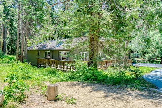 42055 Saddleback Rd, Shaver Lake, CA 93664 - view of front of home with a deck and a wooded view