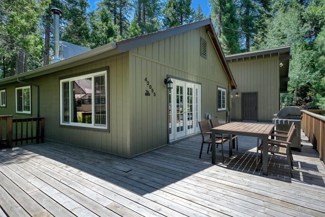 42055 Saddleback Rd, Shaver Lake, CA 93664 - wooden deck featuring outdoor dining area, french doors, and grilling area