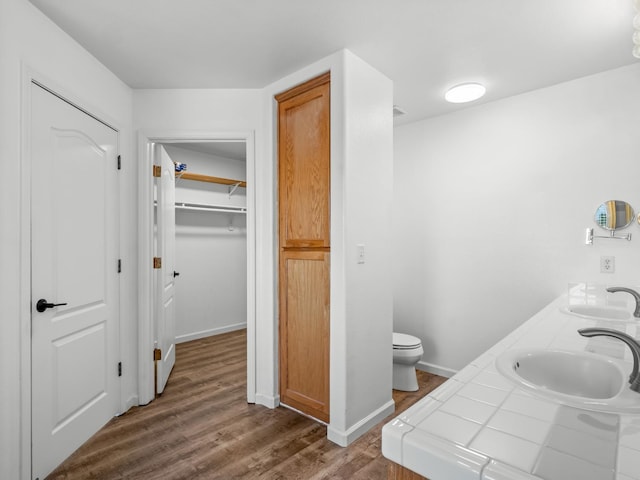 180 N Anderson Ave, Clovis, CA 93612 - full bath featuring wood finished floors, double vanity, and a spacious closet