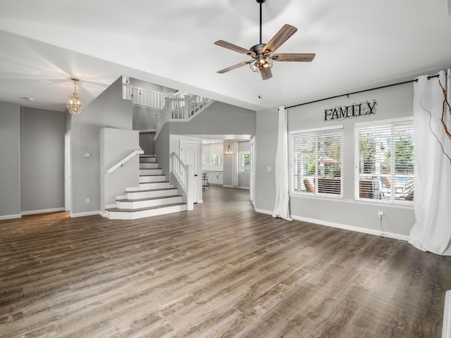 180 N Anderson Ave, Clovis, CA 93612 - unfurnished living room with stairs, plenty of natural light, wood finished floors, and ceiling fan