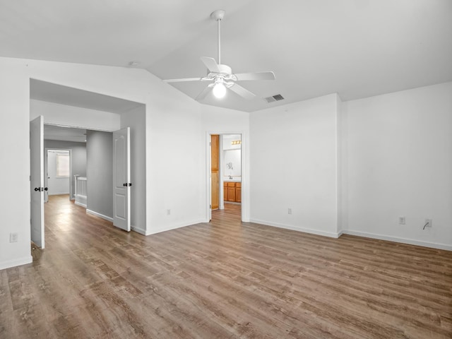 180 N Anderson Ave, Clovis, CA 93612 - empty room with a ceiling fan, wood finished floors, and vaulted ceiling
