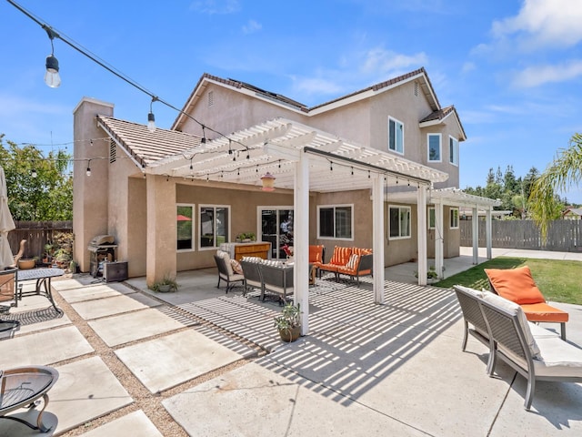 180 N Anderson Ave, Clovis, CA 93612 - rear view of property with a pergola, a fenced backyard, stucco siding, an outdoor living space, and a patio area