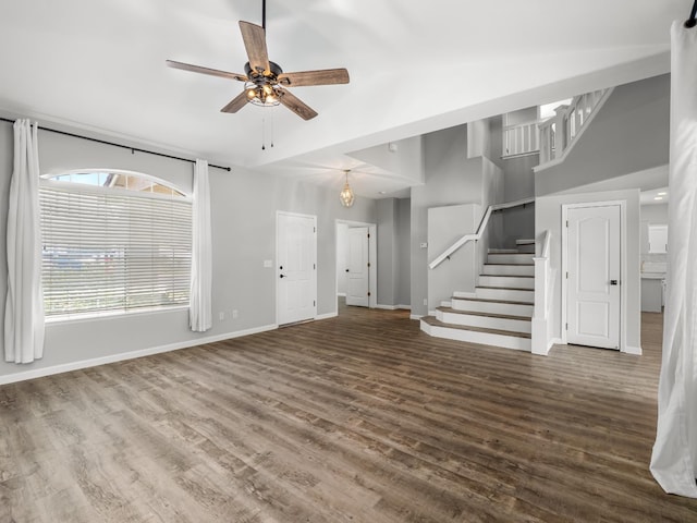 180 N Anderson Ave, Clovis, CA 93612 - unfurnished living room featuring stairs, wood finished floors, and ceiling fan