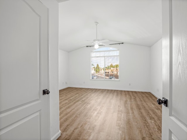 180 N Anderson Ave, Clovis, CA 93612 - unfurnished room featuring a ceiling fan, wood finished floors, and vaulted ceiling