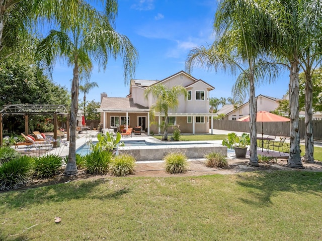 180 N Anderson Ave, Clovis, CA 93612 - back of property featuring an outdoor pool, a patio area, a pergola, a chimney, and stucco siding