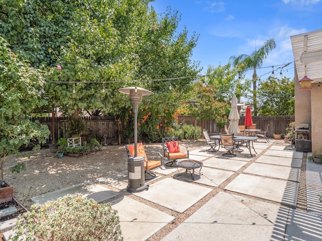 180 N Anderson Ave, Clovis, CA 93612 - fenced backyard featuring a patio area and outdoor dining area