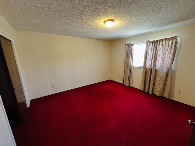 3043 N Brunswick Ave, Fresno, CA 93722 - spare room with carpet flooring and a textured ceiling