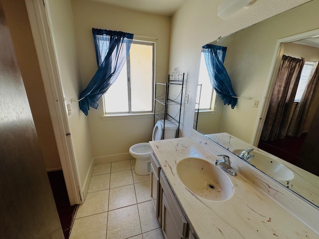 3043 N Brunswick Ave, Fresno, CA 93722 - bathroom with vanity and tile patterned flooring