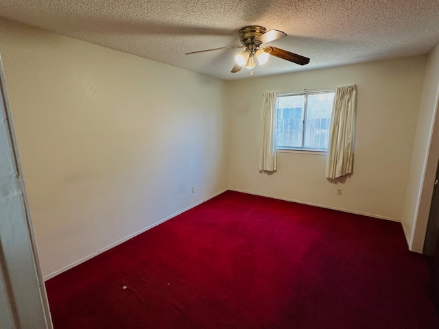3043 N Brunswick Ave, Fresno, CA 93722 - unfurnished room featuring ceiling fan, dark colored carpet, and a textured ceiling
