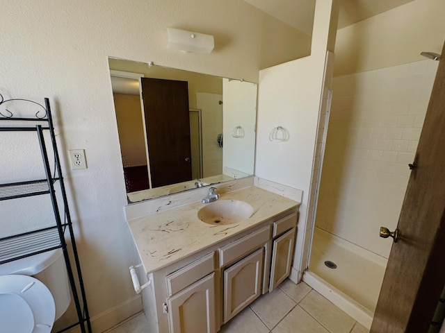 3043 N Brunswick Ave, Fresno, CA 93722 - bathroom with vanity, a shower stall, and tile patterned floors
