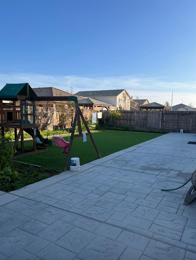 4542 N Casey Ave, Fresno, CA 93723 - view of patio featuring a playground