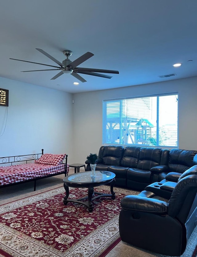 4542 N Casey Ave, Fresno, CA 93723 - carpeted living area featuring a ceiling fan and recessed lighting