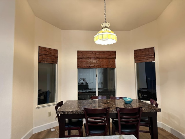 2526 Gibson Ave, Clovis, CA 93611 - dining space featuring baseboards and dark wood-style flooring