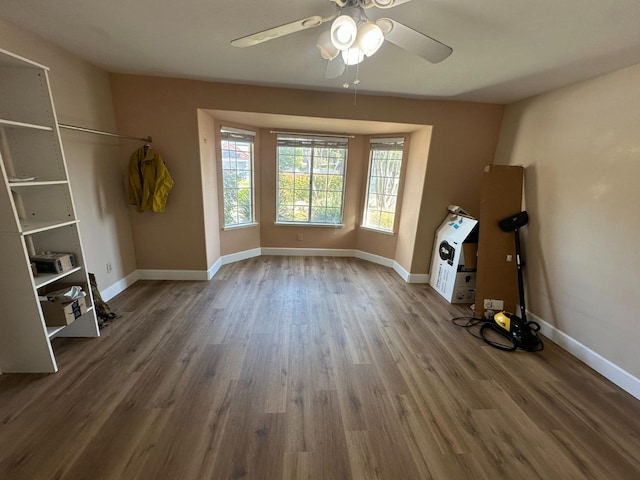 2526 Gibson Ave, Clovis, CA 93611 - unfurnished living room featuring wood finished floors and a ceiling fan