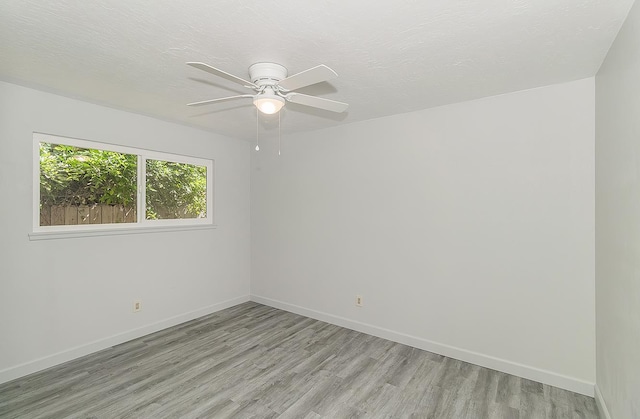 6683 N Spalding Ave, Fresno, CA 93710 - spare room with light wood-type flooring and ceiling fan