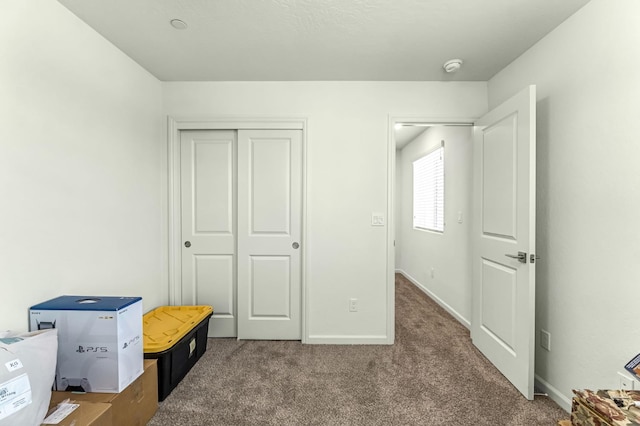 2047 N Ralph Ln, Clovis, CA 93619 - bedroom with carpet floors, a closet, and refrigerator
