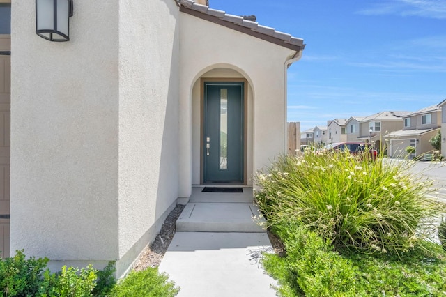 2047 N Ralph Ln, Clovis, CA 93619 - doorway to property with a residential view and stucco siding