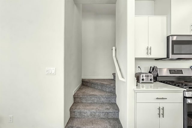 2047 N Ralph Ln, Clovis, CA 93619 - stairway featuring carpet and baseboards