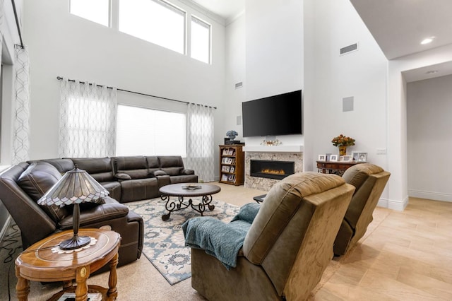4693 Del Oro Rd, Madera, CA 93636 - living room with a high ceiling and a lit fireplace