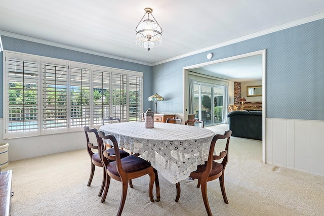 1216 E Pico Ave, Fresno, CA 93704 - dining area with carpet, plenty of natural light, crown molding, and a chandelier