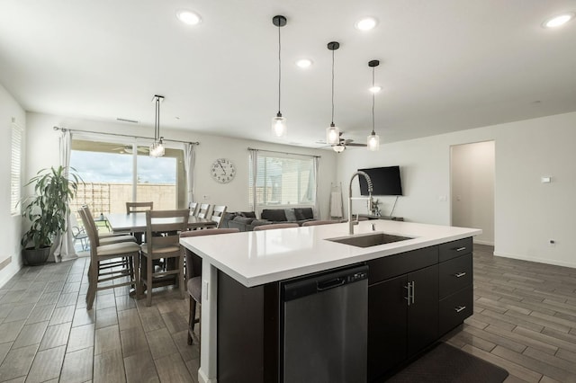 644 Atlantica Dr S, Madera, CA 93636 - kitchen featuring dishwasher, light countertops, dark cabinets, a ceiling fan, and recessed lighting