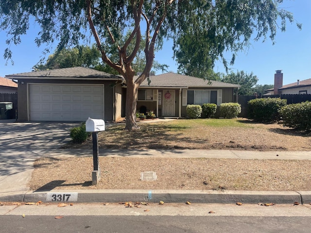 3317 W Indianapolis Ave, Fresno, CA 93722 - single story home with an attached garage and driveway
