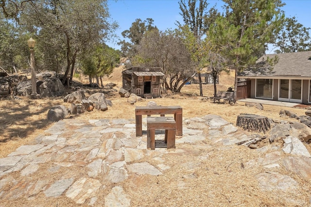 42617 John Muir Dr, Coarsegold, CA 93614 - view of patio / terrace featuring an outbuilding