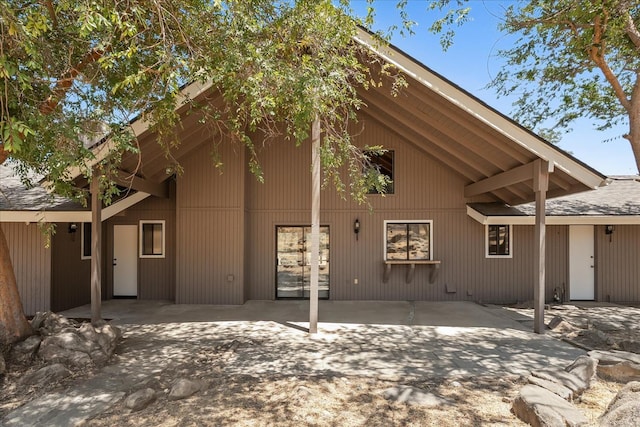 42617 John Muir Dr, Coarsegold, CA 93614 - back of house featuring a patio and roof with shingles