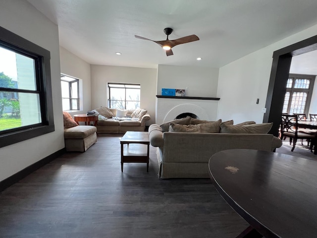 345 N Van Ness Ave, Fresno, CA 93701 - living area with dark wood-style flooring, a fireplace, a ceiling fan, and recessed lighting