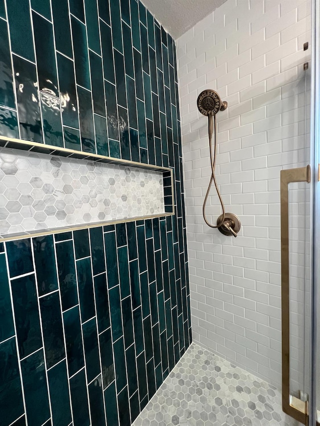 345 N Van Ness Ave, Fresno, CA 93701 - bathroom featuring a stall shower and a textured ceiling