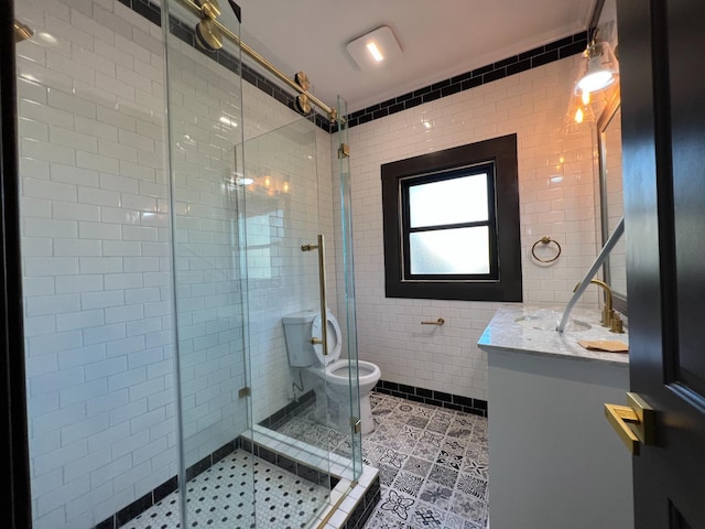 345 N Van Ness Ave, Fresno, CA 93701 - bathroom featuring tile walls, vanity, a stall shower, and tile patterned flooring