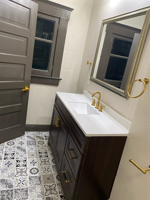 345 N Van Ness Ave, Fresno, CA 93701 - bathroom featuring vanity and a textured wall