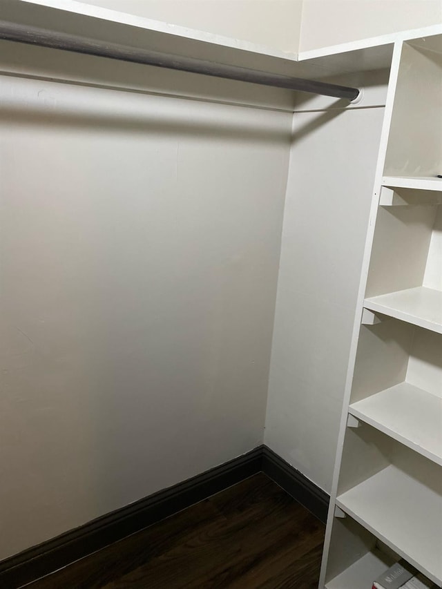 345 N Van Ness Ave, Fresno, CA 93701 - walk in closet featuring dark wood-type flooring
