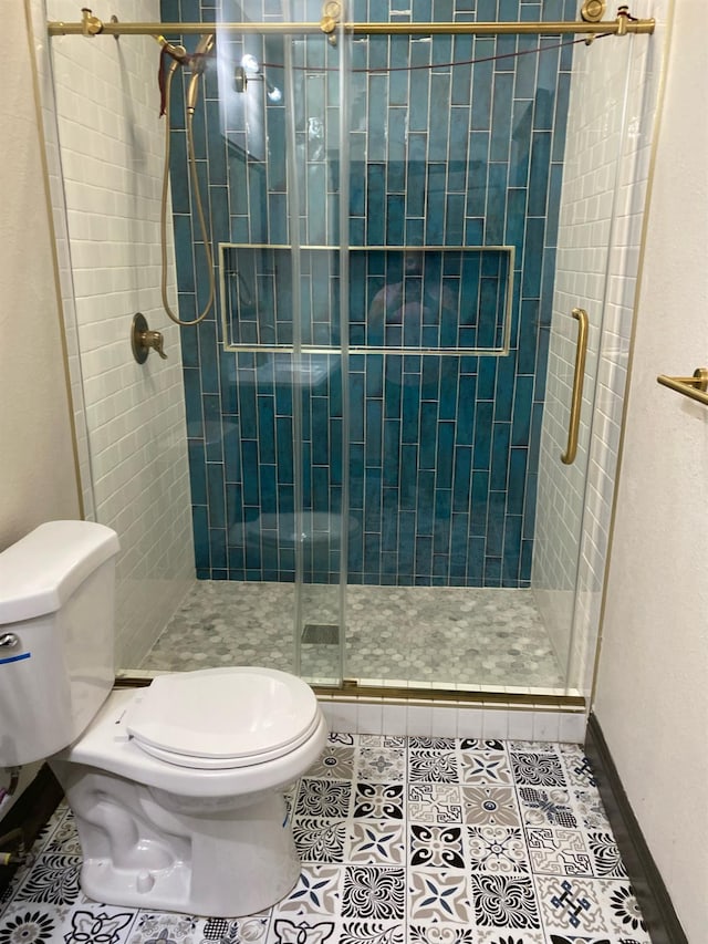 345 N Van Ness Ave, Fresno, CA 93701 - full bath featuring a stall shower and tile patterned floors