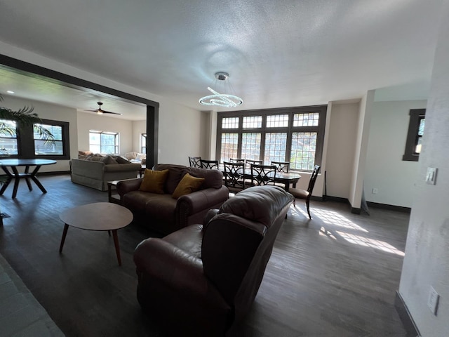 345 N Van Ness Ave, Fresno, CA 93701 - living room with dark wood-style flooring and a textured ceiling