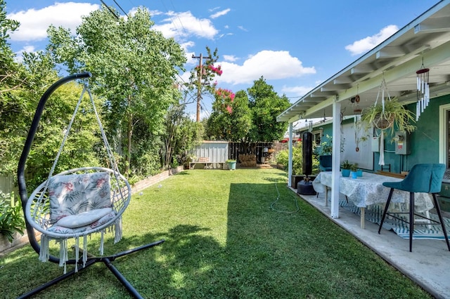 4653 N Fisher St, Fresno, CA 93726 - fenced backyard with a patio