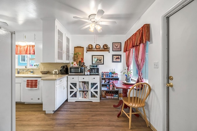4653 N Fisher St, Fresno, CA 93726 - kitchen with stainless steel microwave, dishwasher, wood finished floors, and white cabinets