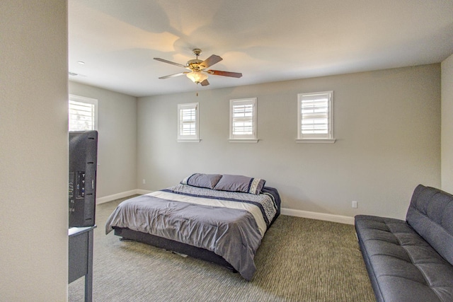 2286 N Janice Ave, Fresno, CA 93737 - carpeted bedroom featuring multiple windows and a ceiling fan