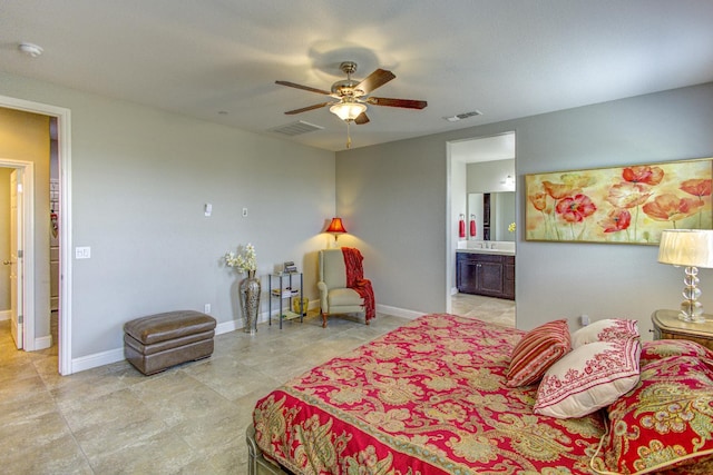 2286 N Janice Ave, Fresno, CA 93737 - bedroom with connected bathroom, light tile patterned flooring, and ceiling fan