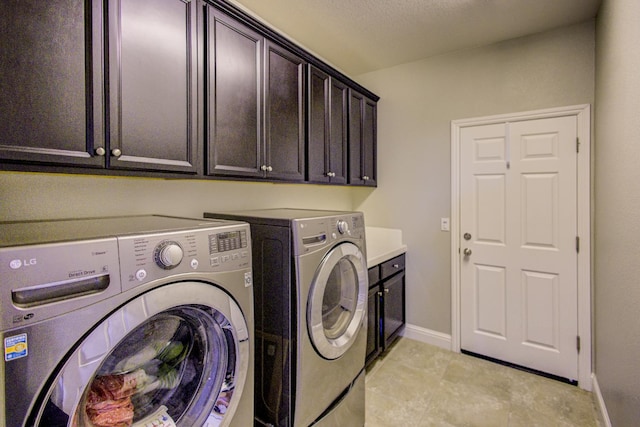 2286 N Janice Ave, Fresno, CA 93737 - laundry area featuring separate washer and dryer and cabinet space