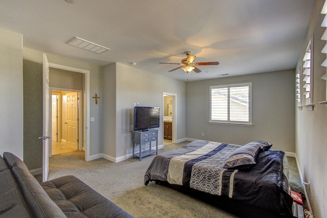 2286 N Janice Ave, Fresno, CA 93737 - bedroom featuring light colored carpet, a ceiling fan, and ensuite bathroom