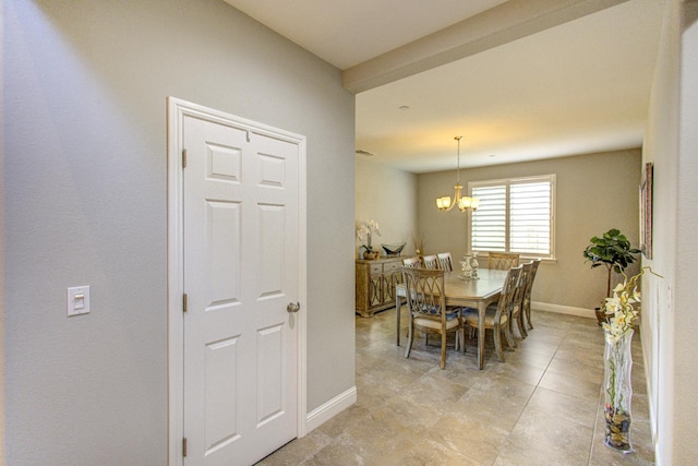 2286 N Janice Ave, Fresno, CA 93737 - dining room featuring baseboards and a chandelier