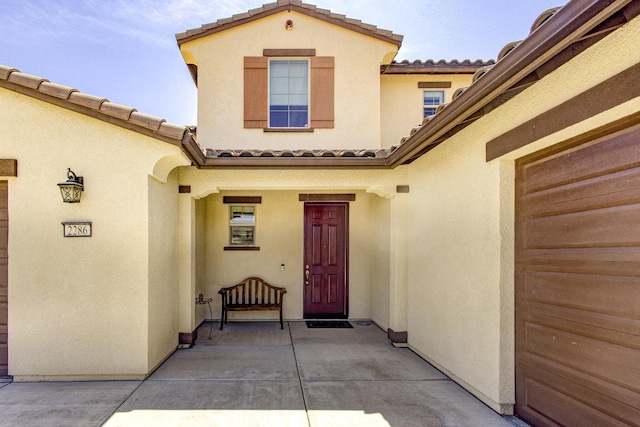 2286 N Janice Ave, Fresno, CA 93737 - entrance to property with a tiled roof and stucco siding