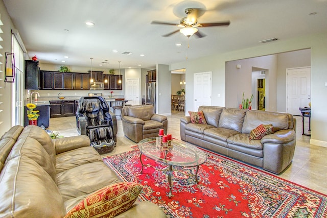 2286 N Janice Ave, Fresno, CA 93737 - living area with a ceiling fan, light tile patterned floors, and recessed lighting