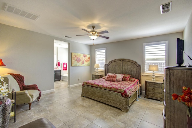 2286 N Janice Ave, Fresno, CA 93737 - bedroom featuring ensuite bathroom, light tile patterned floors, and a ceiling fan