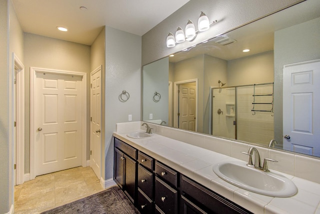 2286 N Janice Ave, Fresno, CA 93737 - full bath with double vanity, a stall shower, and recessed lighting